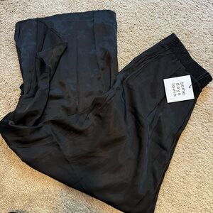Black silk-like split front pant
